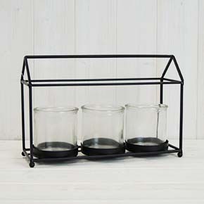 Gorgeous black house shape tealight. Perfect for a gift or as a decoration in your home! detail page